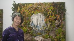 Kifumi Keppler, owner of Exotic Plants, in her moss art gallery.