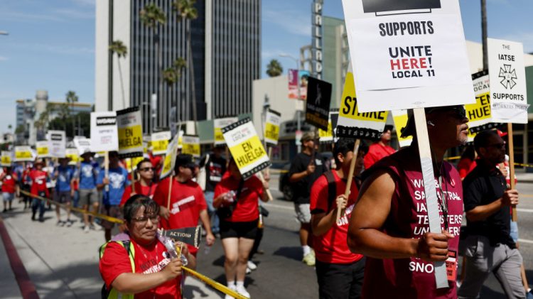 Image for display with article titled Striking actors, writers, hotel workers make the personal political