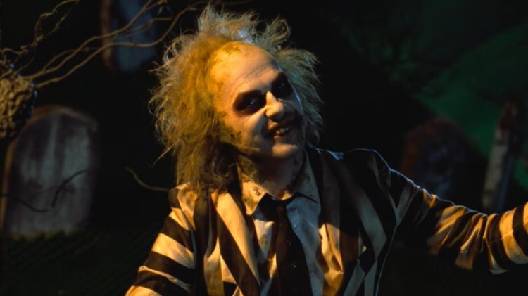 Image for display with article titled Sloppy Sequel: ‘Beetlejuice Beetlejuice’ Has Fun Moments, but It’s a Frantic, Cluttered Mess