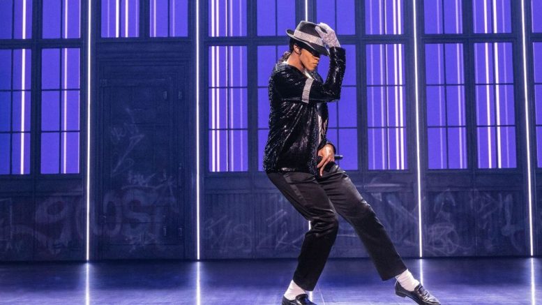 Dancer on a purple stage